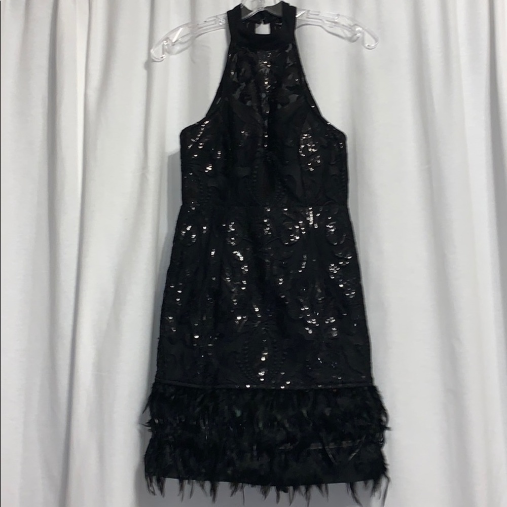 Black Sequin Dress with feather detailing!